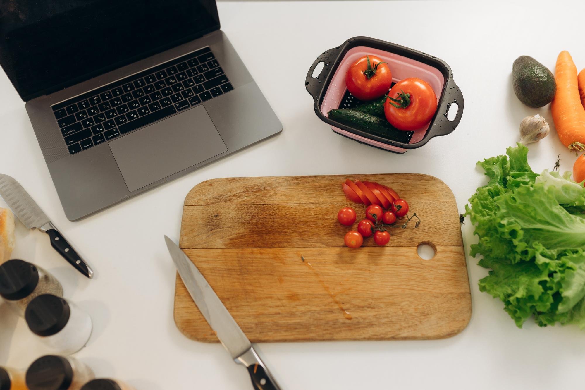 Open kitchen workspace with cutting board and fresh ingredients